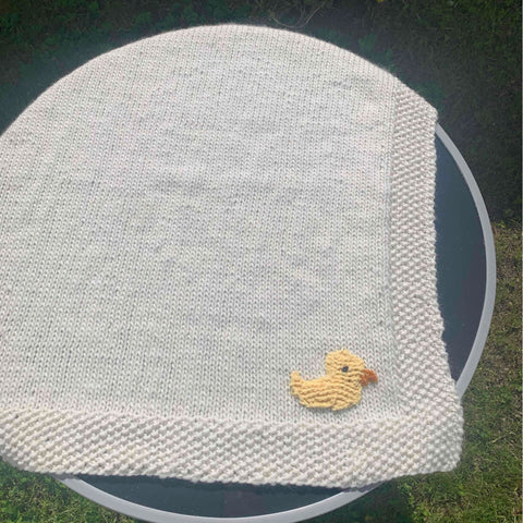 Couverture bébé tricotée main bretagne «Cute little duck »